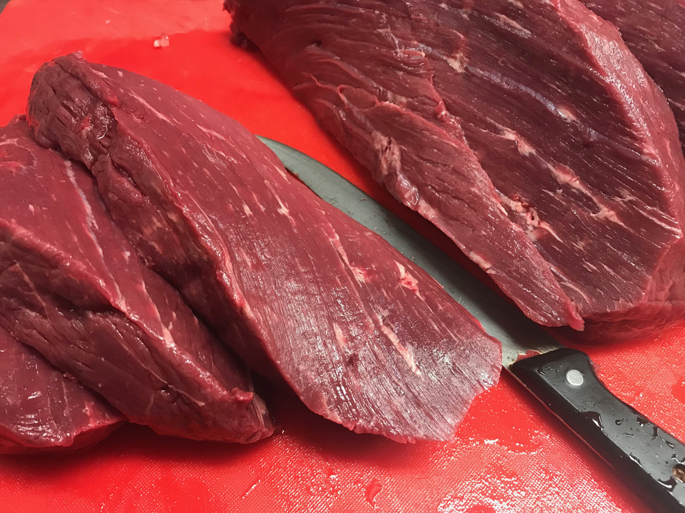 slicing meat for beef jerky